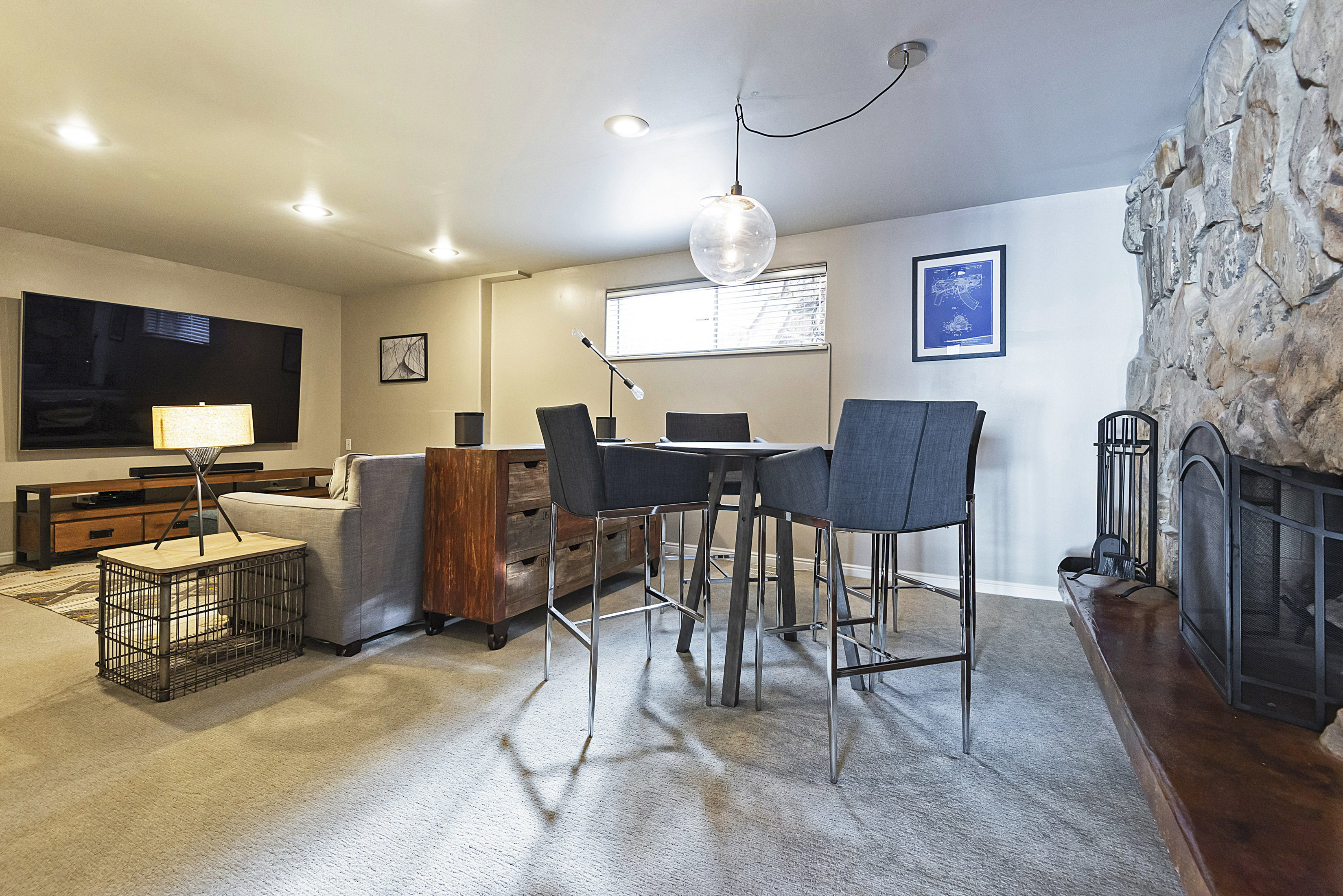 Dining space featuring a fireplace and carpet floors