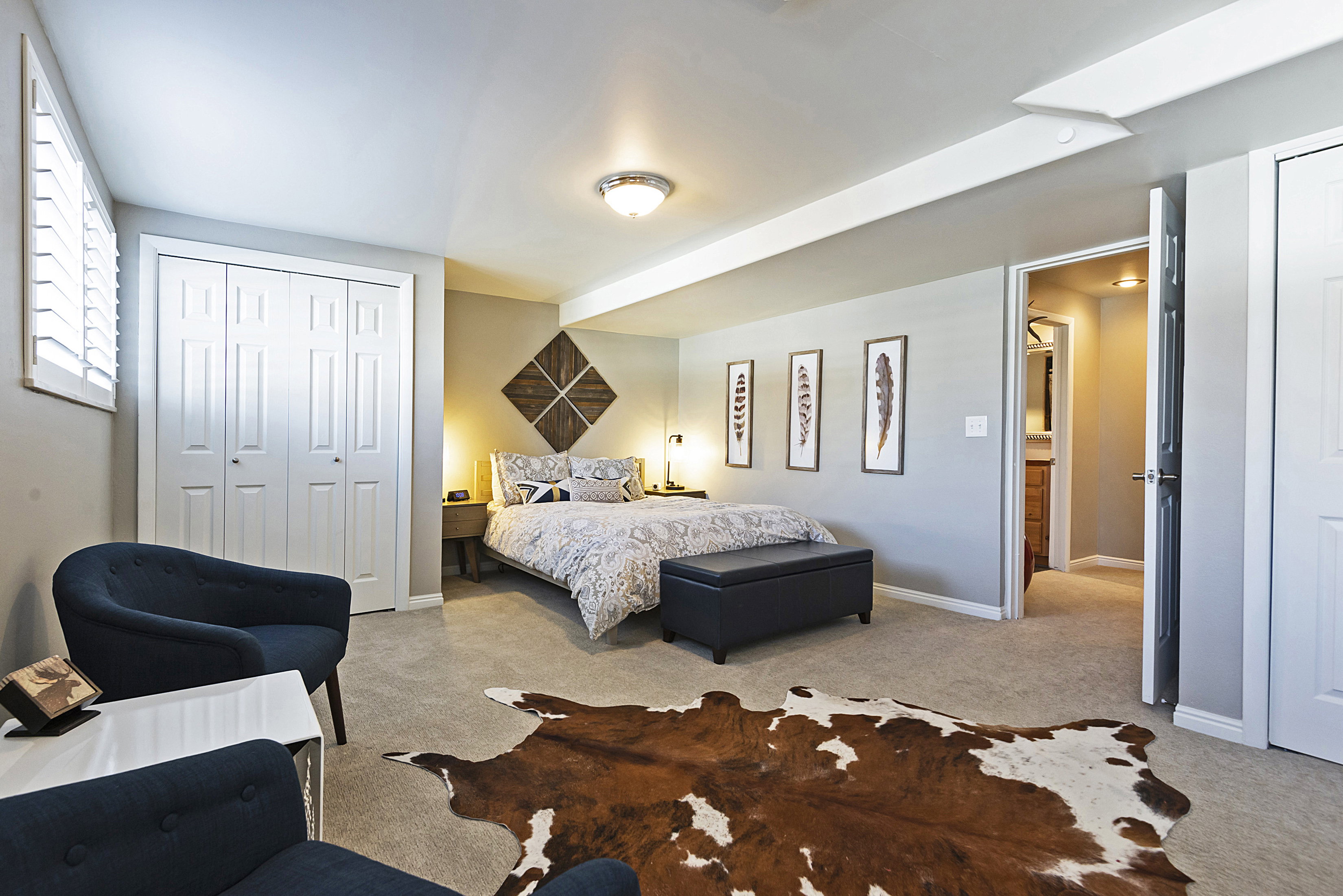Bedroom with carpet and a closet