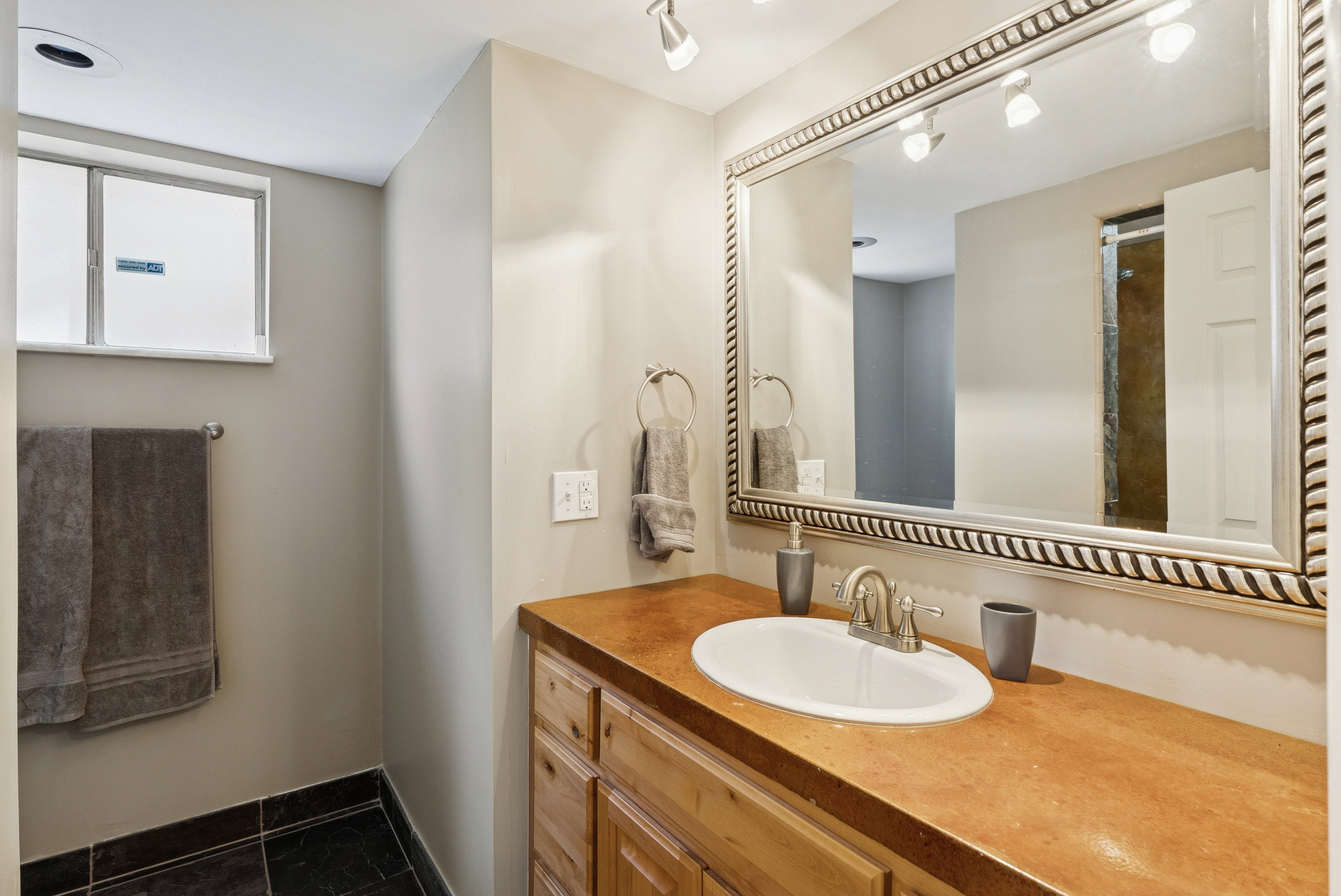 Full bathroom featuring vanity and a stall shower