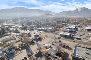 Aerial view of residential area featuring a mountain backdrop