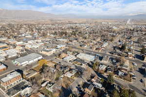 Aerial view of residential area with a mountainous background