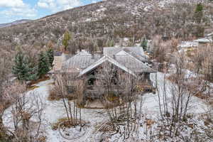 Snowy aerial view with a mountain view