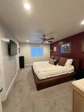 Bedroom featuring carpet flooring, ceiling fan, and recessed lighting