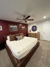 Bedroom with carpet floors, a ceiling fan, and recessed lighting