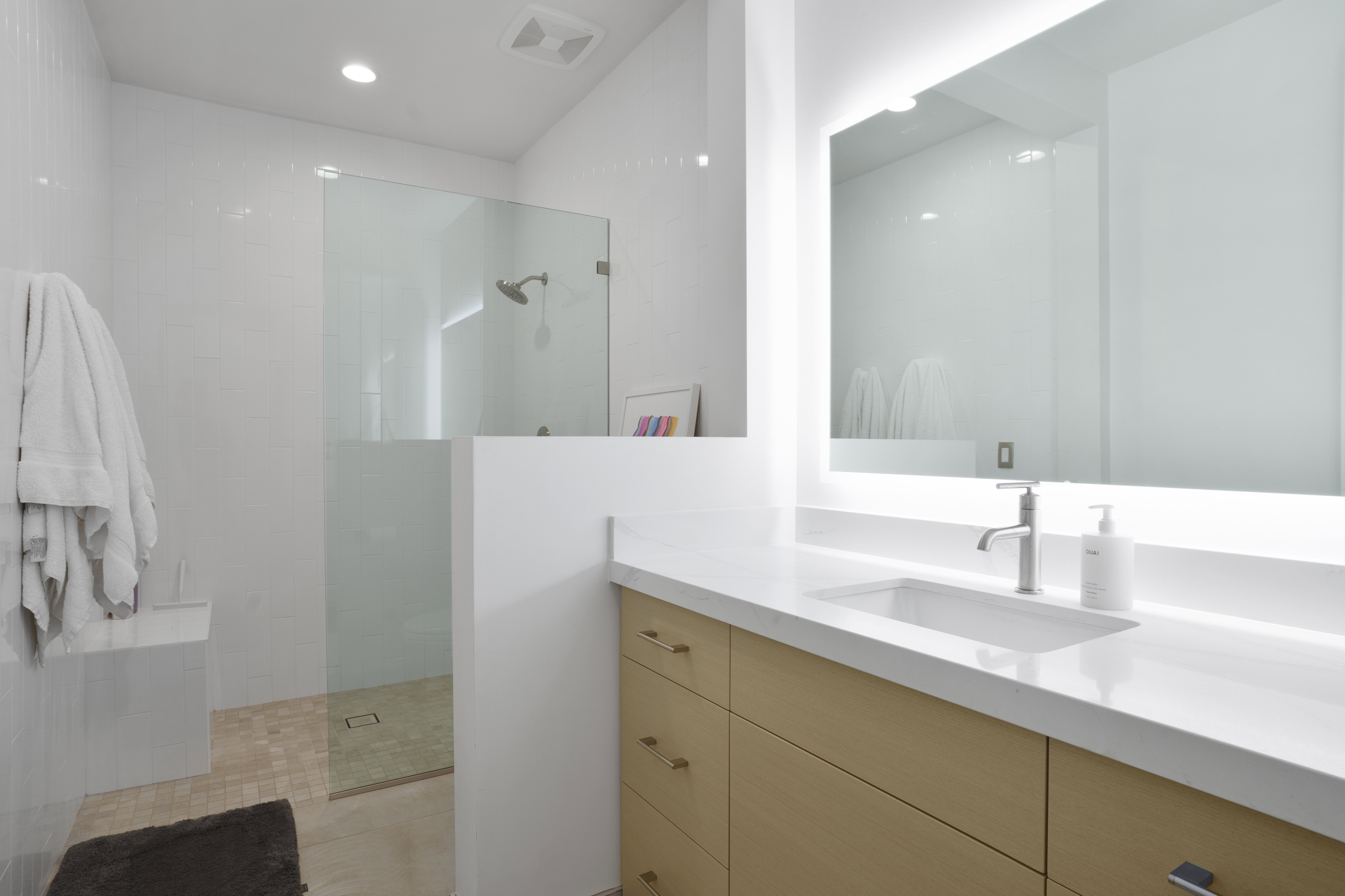 Full bath with walk in shower, vanity, and recessed lighting