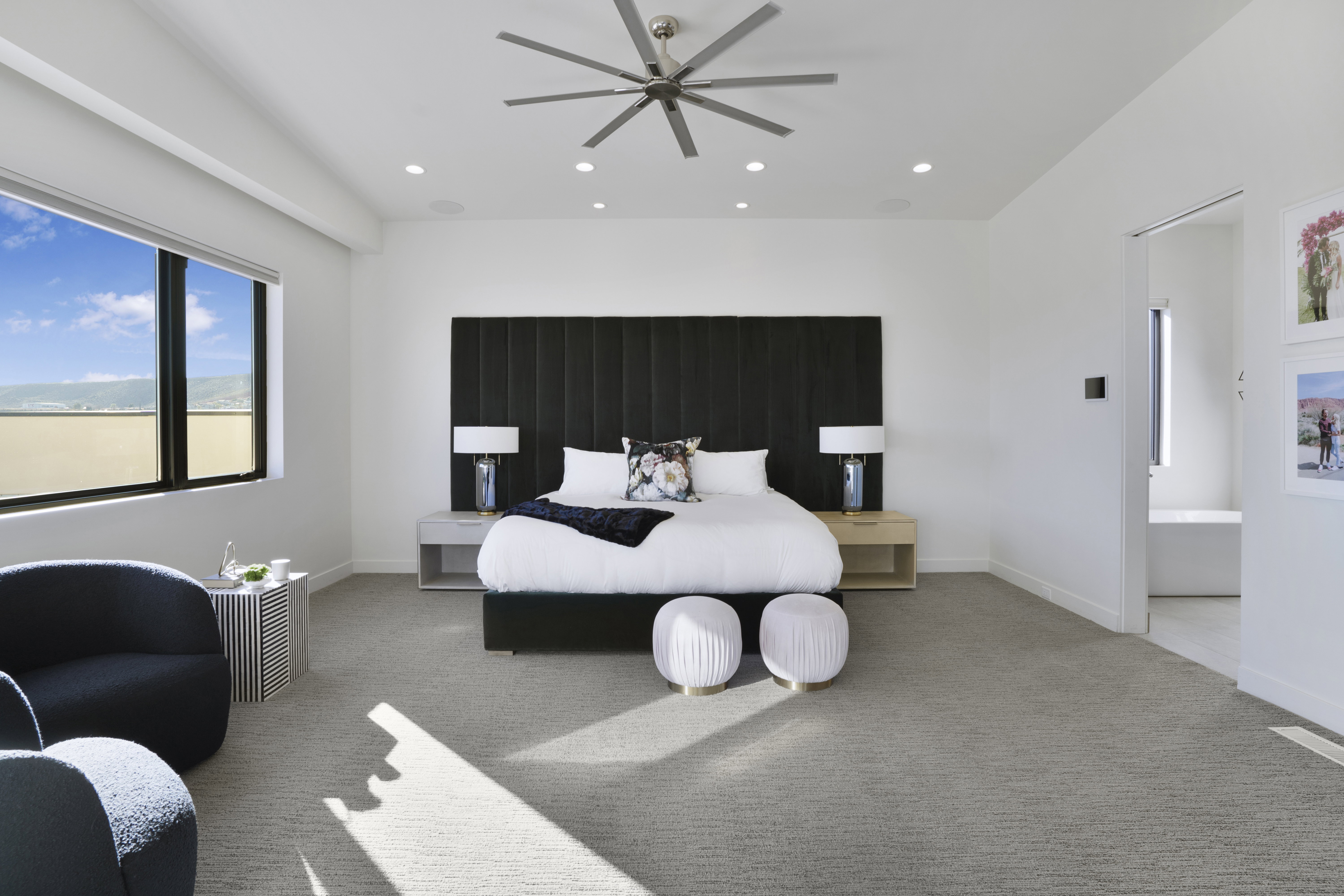 Carpeted bedroom with recessed lighting and ceiling fan