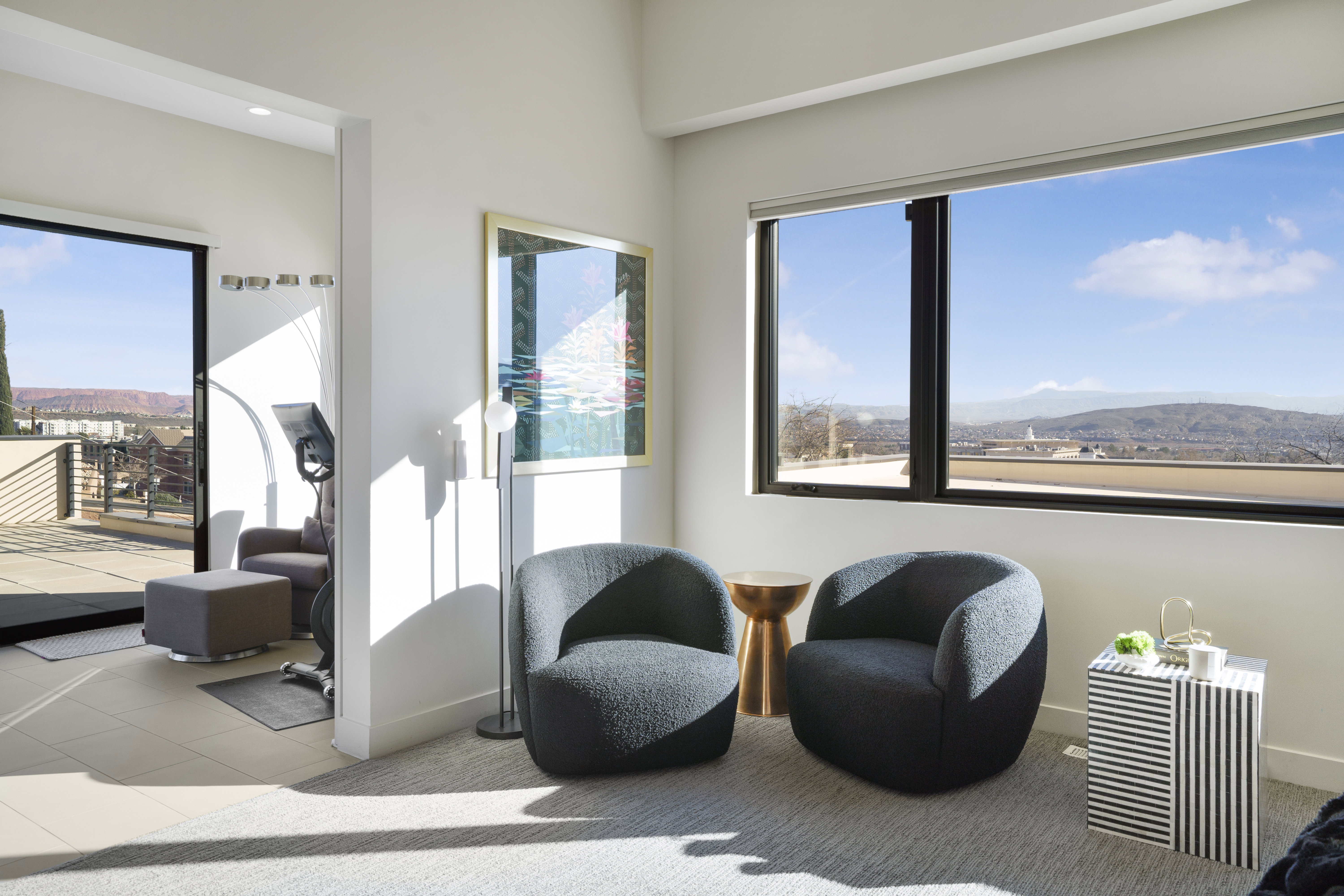Living area featuring a mountain view and tile patterned flooring