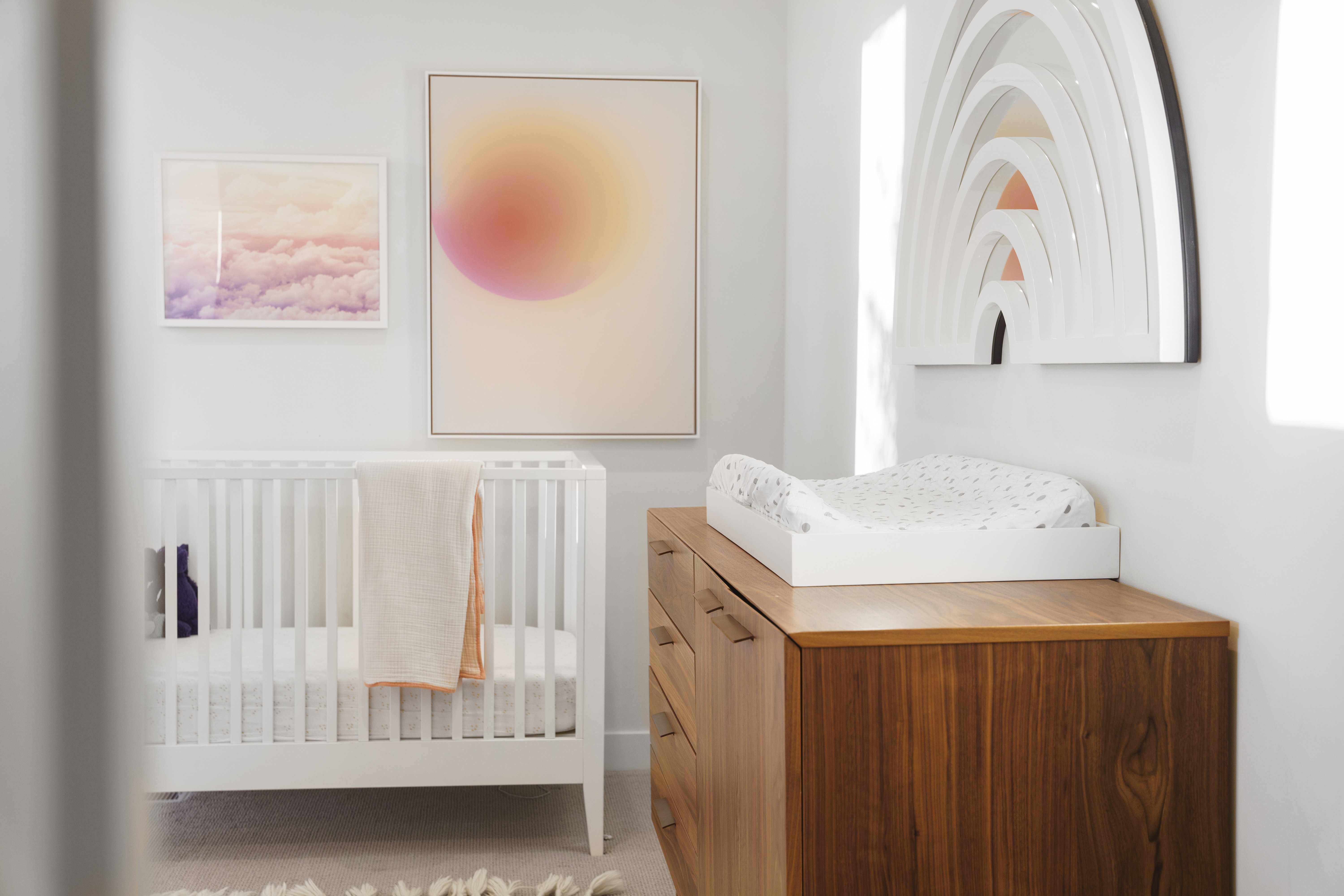 Bedroom featuring a crib