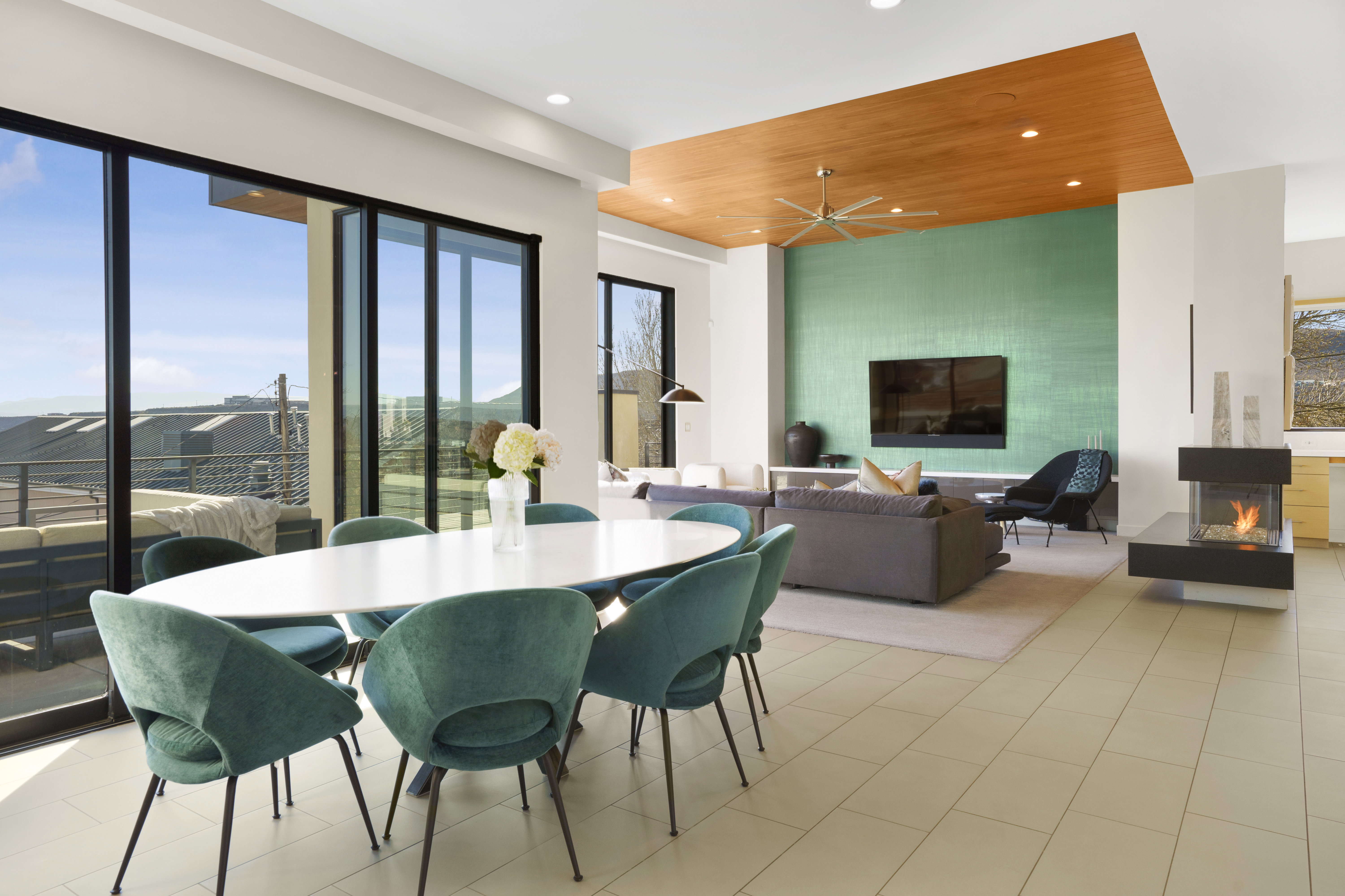 Dining space featuring plenty of natural light, recessed lighting, a ceiling fan, and a fireplace