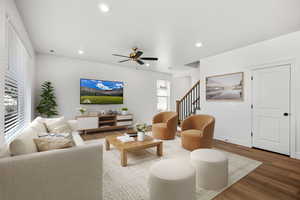 Living room featuring wood finished floors, a ceiling fan, and recessed lighting