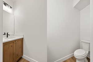 Bathroom featuring vanity and light wood-type flooring