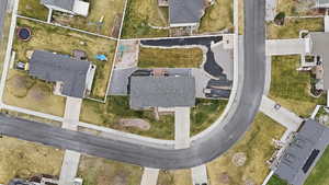 View of property location with nearby suburban area