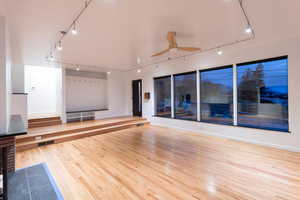 Beautiful family room with large sound proof windows.