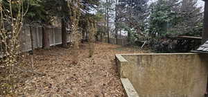 View of fenced backyard