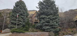 View of property with a mountain view