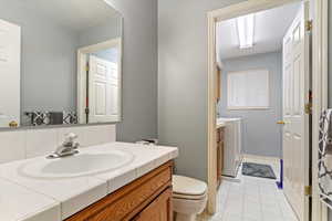 Half Bath & Separate Laundry Space