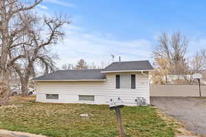 View of front of property featuring roof with shingles