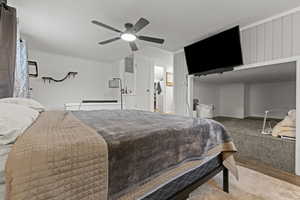 Bedroom featuring a ceiling fan