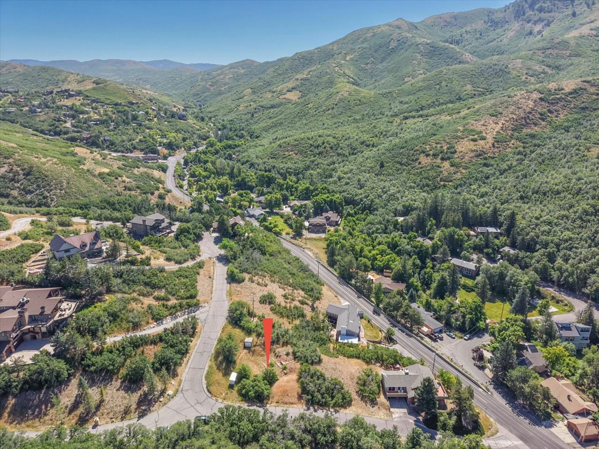 Expansive mountain terrain with a clear sky backdrop