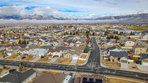 Aerial perspective of suburban area featuring mountains