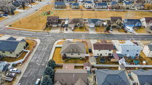 Aerial view of property's location featuring nearby suburban area