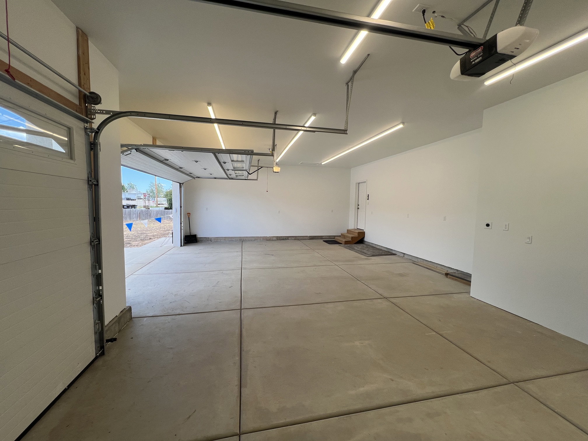 A large 3-car garage - fits large vehicles and space for a boat. Also,  wired for electric vehicles.