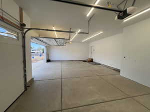 A large 3-car garage - fits large vehicles and space for a boat. Also,  wired for electric vehicles.