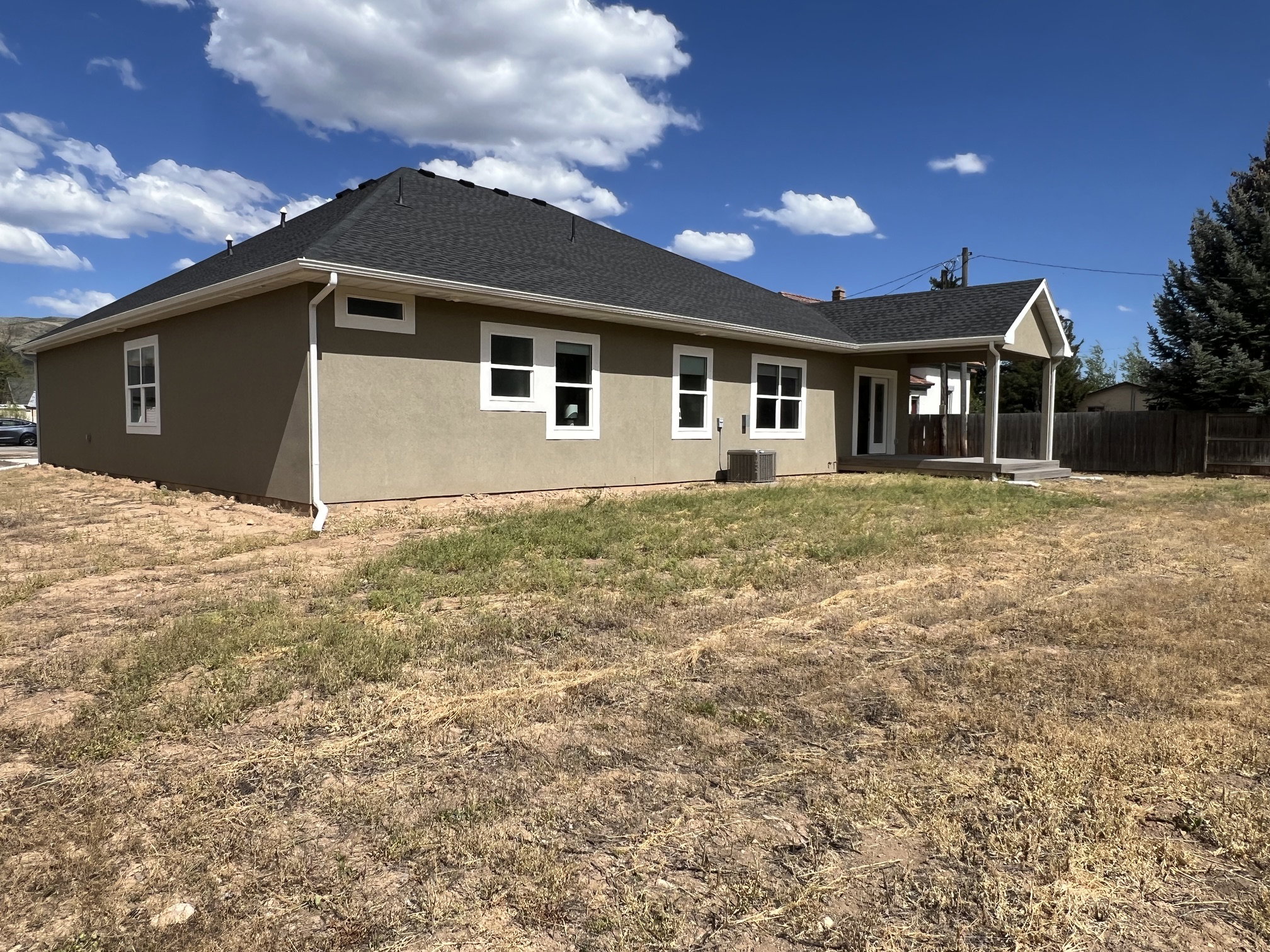 Spacious Side yard with 22O power and space for a large RV
