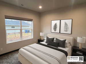 Bedroom with carpet floors and recessed lighting