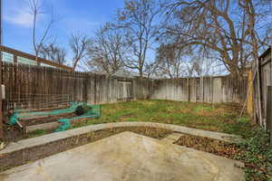 Fenced backyard featuring a patio area