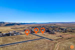 View of rural area featuring a mountainous background and a desert landscape