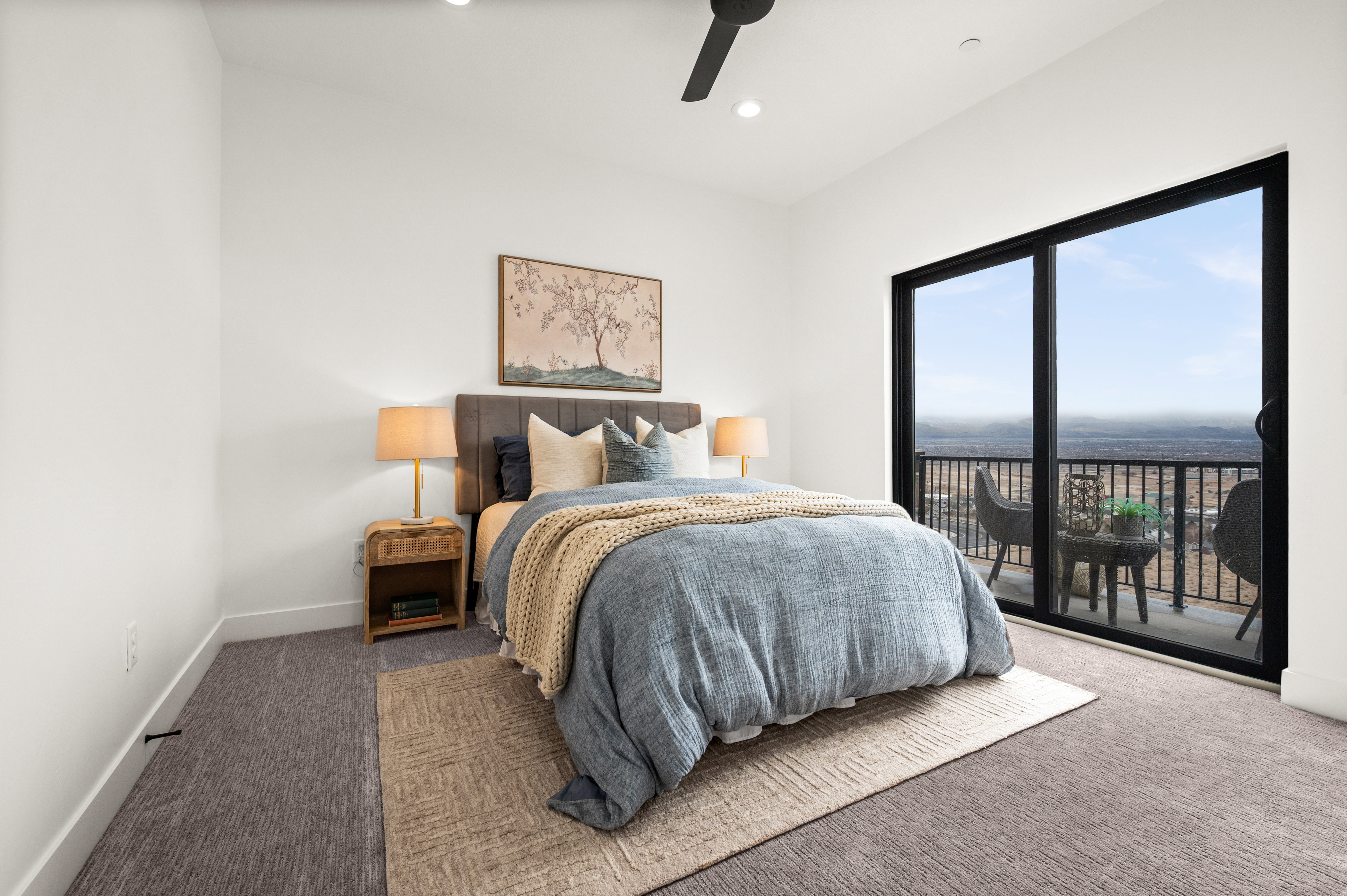 Primary bedroom with balcony