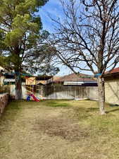 View of yard with a playground