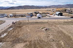 Aerial view of residential area featuring a mountain backdrop