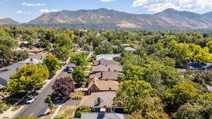 Aerial perspective of suburban area featuring mountains