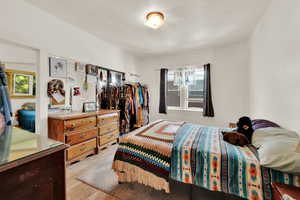 Bedroom featuring light wood-style flooring