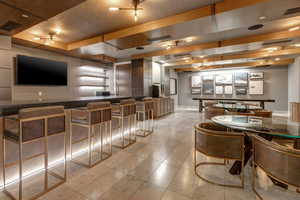 Bar with dark countertops