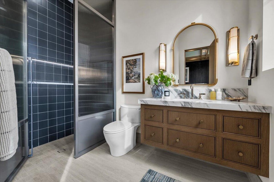 Full bath featuring vanity and a walk in shower