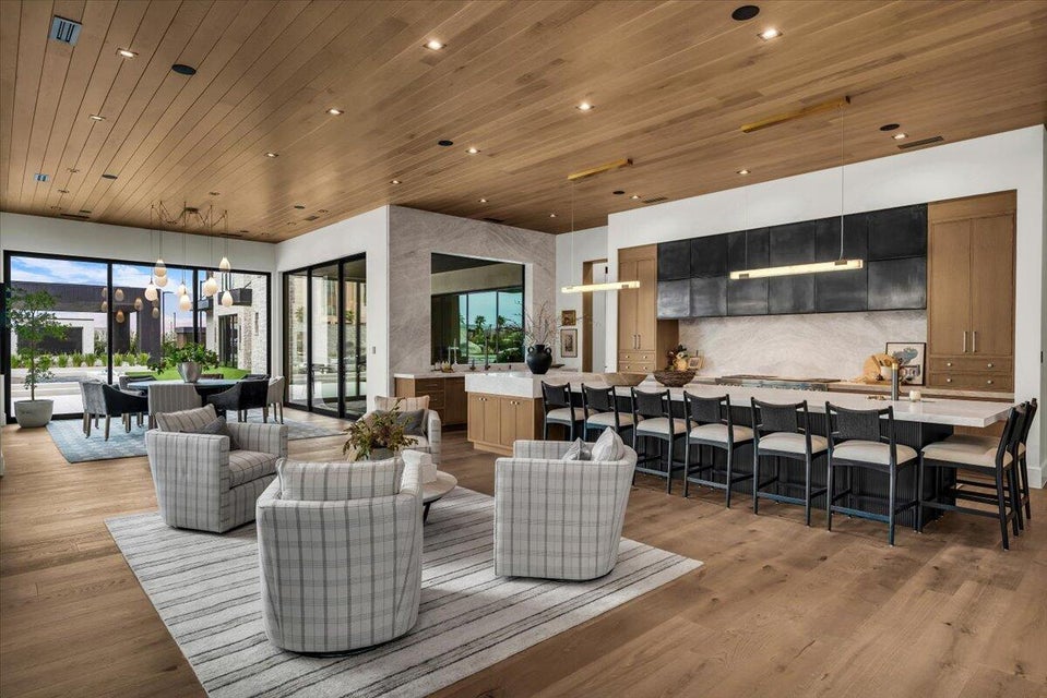 Living area featuring wooden ceiling, light wood finished floors, plenty of natural light, and recessed lighting