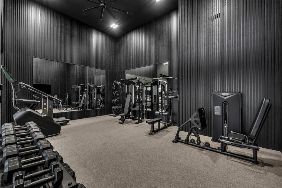 Exercise room with a high ceiling