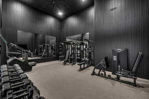 Exercise room with a high ceiling