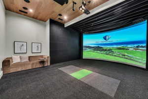 Recreation room with golf simulator and wooden ceiling