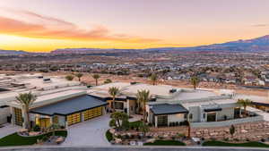Aerial view at dusk of a mountain view and a residential view