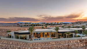 Rear view of property featuring a patio and a mountain view