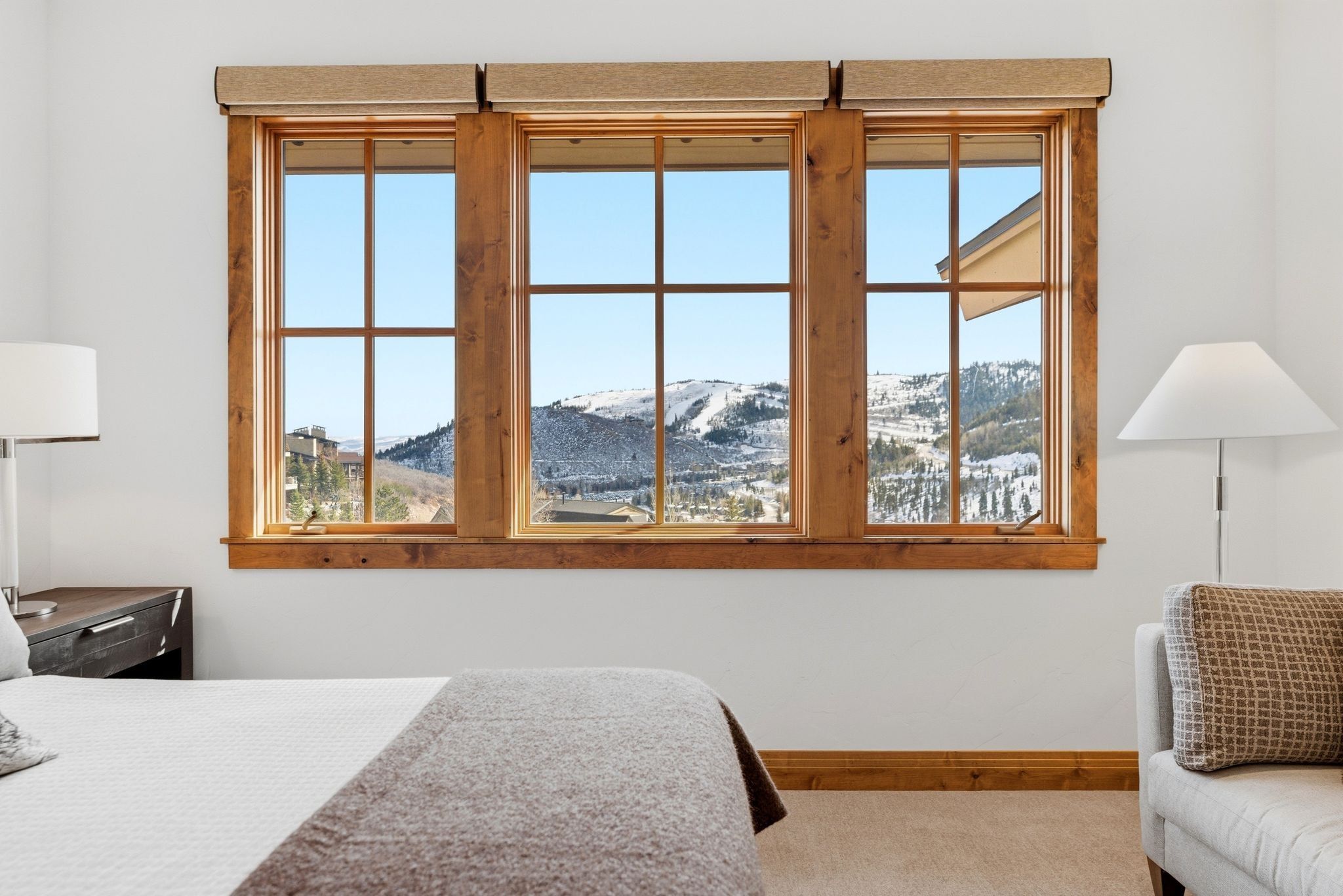 Triple window unit with wood-finish framing