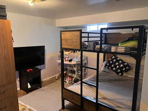 Bedroom with baseboards