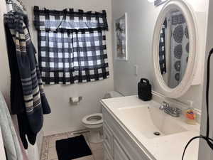 Bathroom featuring vanity and light tile patterned floors