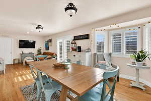 Dining space featuring light wood-style floors