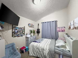 Bedroom featuring carpet flooring