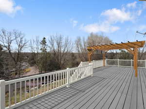 Wooden terrace with a pergola